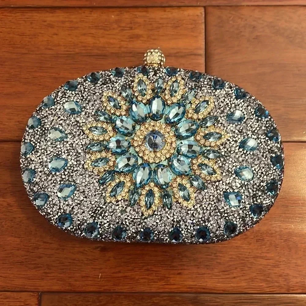 Ramla Aquamarine blue Jeweled bag with removable handles